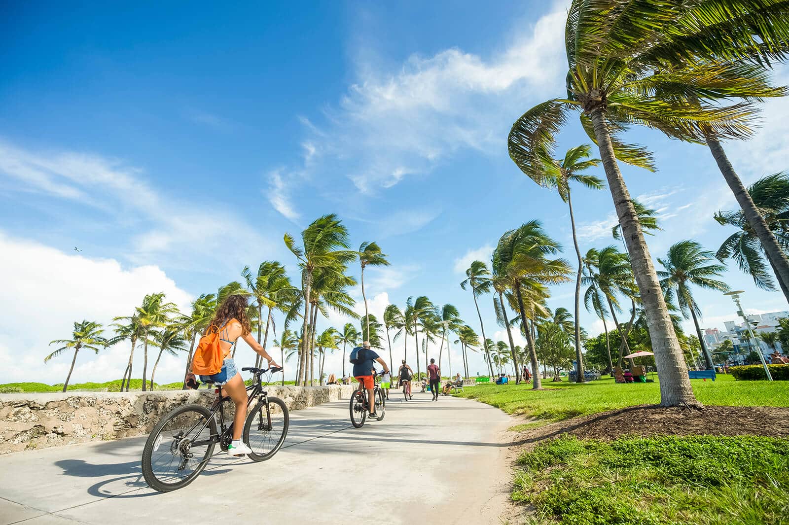 People biking on the trails near our apartments in Parkland, FL.