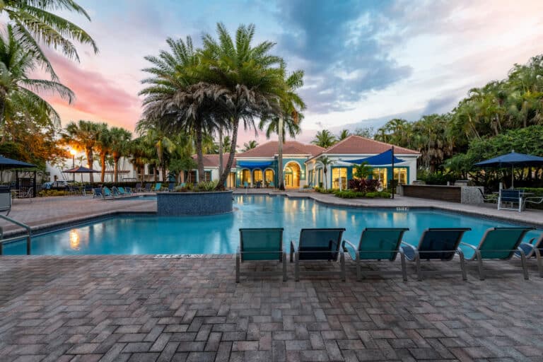 Sunset over our resort-style pool at our Parkland, FL apartments.